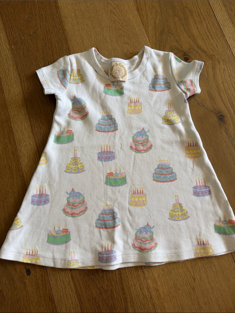 The Beaufort Bonnet Company White Kids Dress with Pastel Cake Print